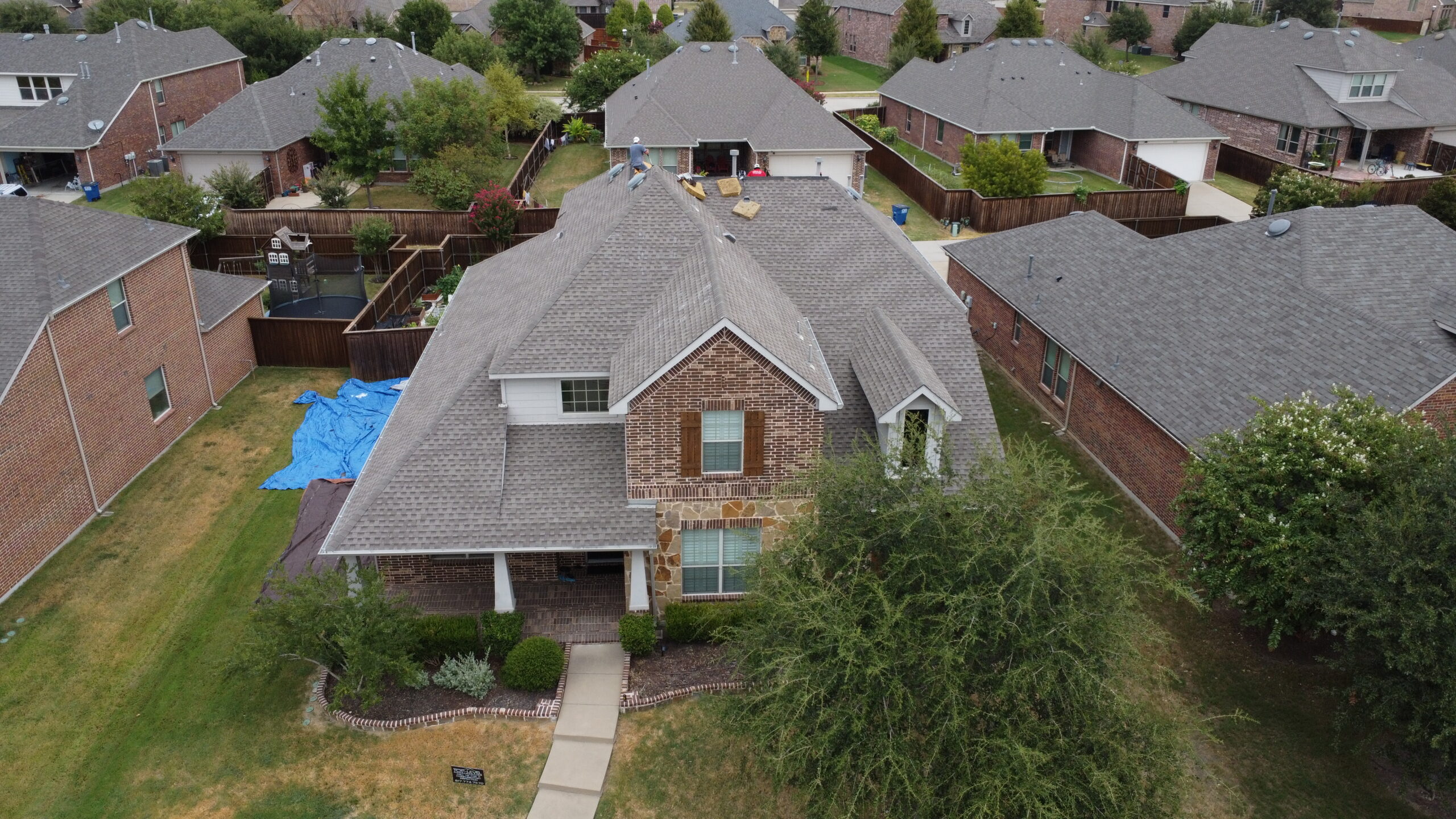 Tear Off Phase Brick Home Roof